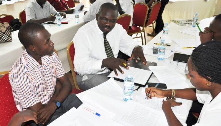 Picture of Participants deliberating during the workshop