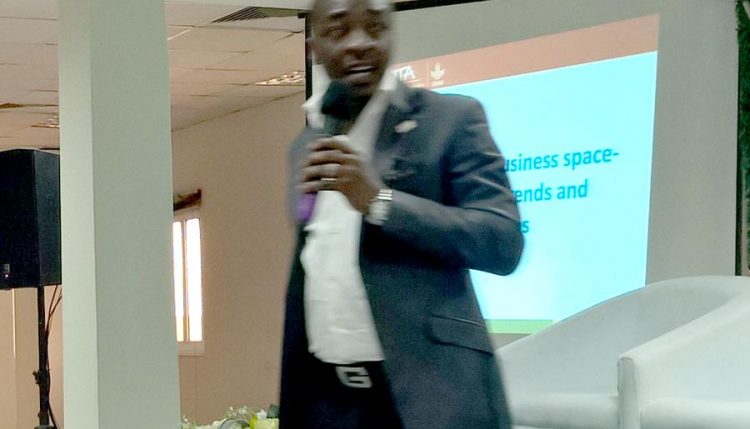 Picture of Layi Olatunji speaks on behalf of BIP at the agribusiness workshop.
