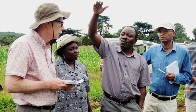 Picture of Baijukya giving a briefing on the long-term trials