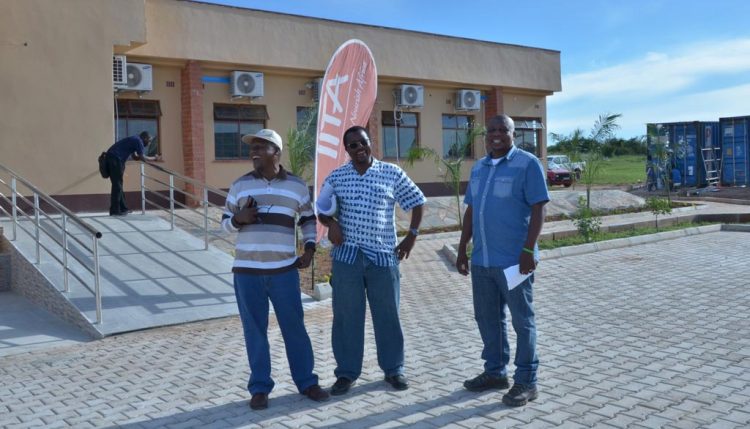 Picture of From left to right: Drs Ntawuruhunga, Chikoye, and Chigeza having a hearty laugh in front of the main science and admin block.