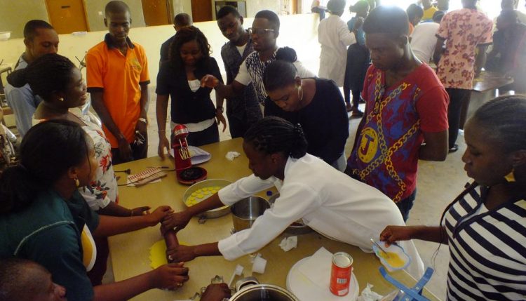 Picture of Youth Agripreneurs preparing food products during the training
