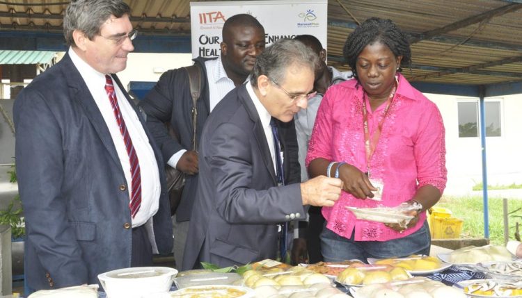 Picture of The IRD delegation tasting cassava food products at the cassava processing center in Ibadan.