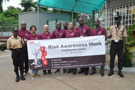 Picture of DDG Ken Dashiell with the Risk Management Committee members flag-off the opening of Risk Awareness Week in IITA.