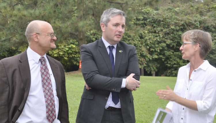 Picture of IITA DDG Partnership for Delivery Kenton Dashiell (left) and Lehmann listen attentively as Ylva Hillbur, IITA DDG Research (right), highlights major agricultural research activities at IITA.