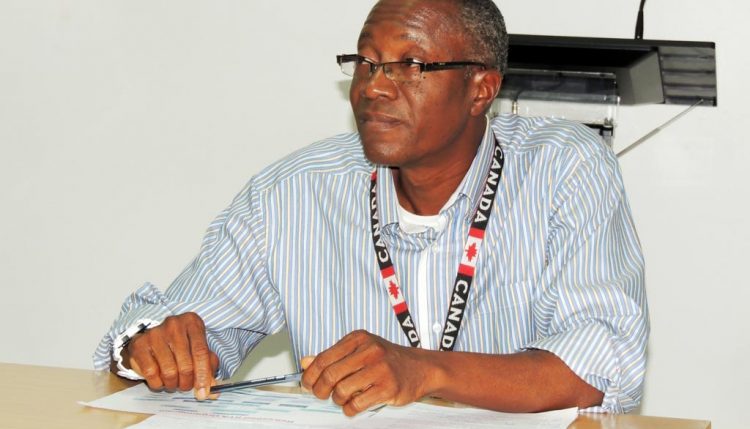 Picture of Omoshalewa Sholola addresses IITA-Tanzania staff.