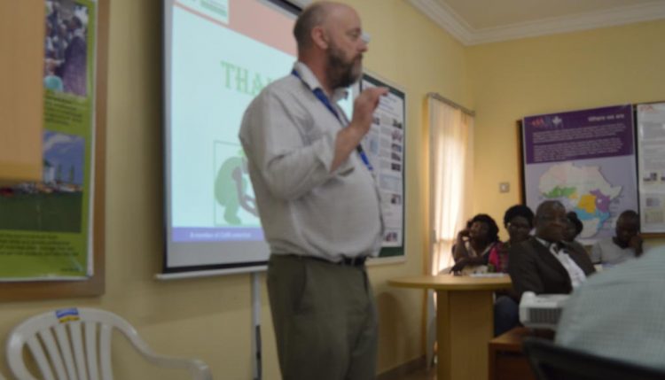 Picture of Dr. Abberton addressing scientists, Agripreneurs and staff in Abuja.