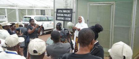 Picture of Dr Morufat Balogun addressing participants at the aeroponics facility at NRCRI.
