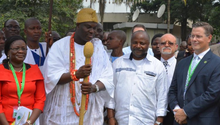 Picture of The Ooni (king) of Ife, also a farmer, participated in the.opening program of the Regional Cocoa Symposium held in IITA.