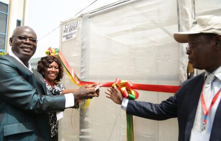 Picture of YIIFSWA Project Leader Norbert Maroya cutting the ribbon during the launch of the aeroponics system at CSIR-Ghana.
