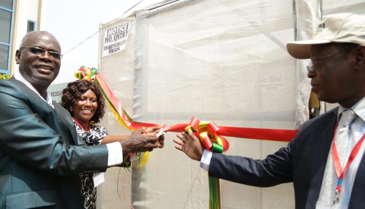 Picture of YIIFSWA Project Leader Norbert Maroya cutting the ribbon during the launch of the aeroponics system at CSIR-Ghana.