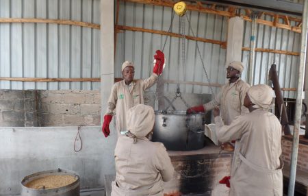 Picture of Lafia Innovation Platfrom members working on the GEM technology parboiler.