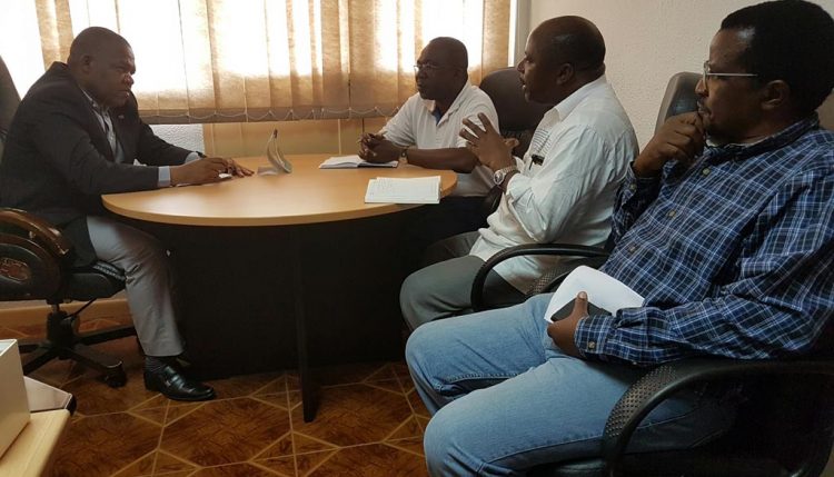Picture of DG Sanginga meeting with DPA Dzucula (extreme left) while Chikoye and Boahen look on.
