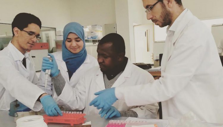 Picture of Mala Kachalla (center) is one of the wheat scientists sponsored by the SARD-SC wheat project.