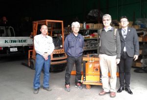 Picture of IITA scientists at the factory