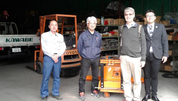 Picture of IITA scientists at the factory