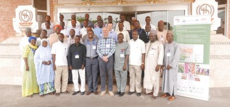 Group photograph of meeting participants in Abuja.