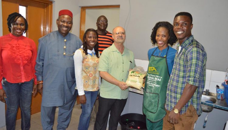 Picture of DDG with the Agripreneurs showing off some of the products.