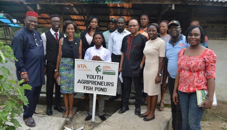 Picture of Director Chiji (center, in black) flanked by the youth agripreneurs and staff in Onne.
