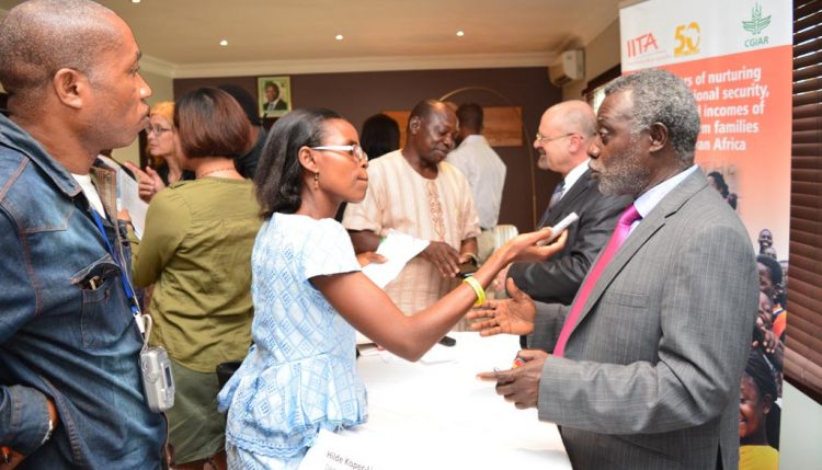 Picture of IITA scientists granting interviews to the press.