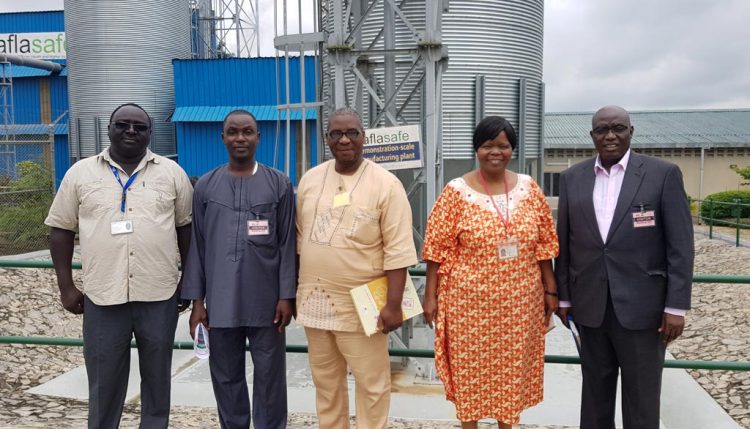 Picture of Dr Bussie Maziya-Dixon (in orange) with the NSPRI delegation visiting the aflasafe plant in IITA, Ibadan.