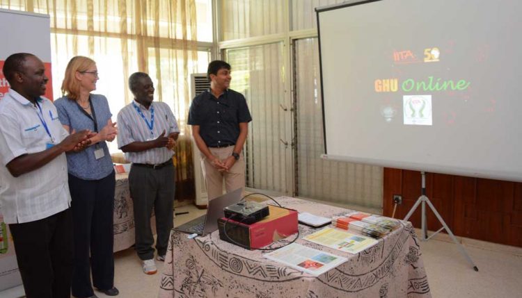 Picture of Tonny Omwansa, Director, Research Support; Hilde Koper, Deputy Director General, Corporate Services; and Robert Asiedu, Director, West Africa Hub, and Lava Kumar, Head Germplasm Health Unit, launch GHU Online.