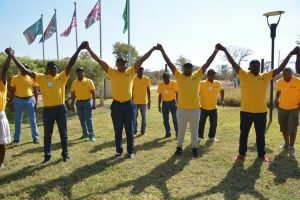 Picture of A sea of gold – SARAH retreat participants having some sun and fun during the team-building exercises.