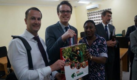 Picture of James Perrin, Regional Manager, Africa and Middle East receives gift from IYA member, Adetola Oladini.