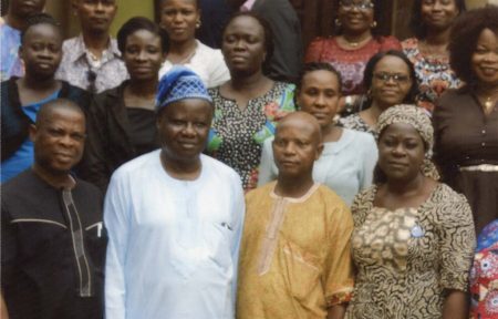 Picture of Librarian Louis Anajekwu with Prof Aina (wearing cap) and other delegates.