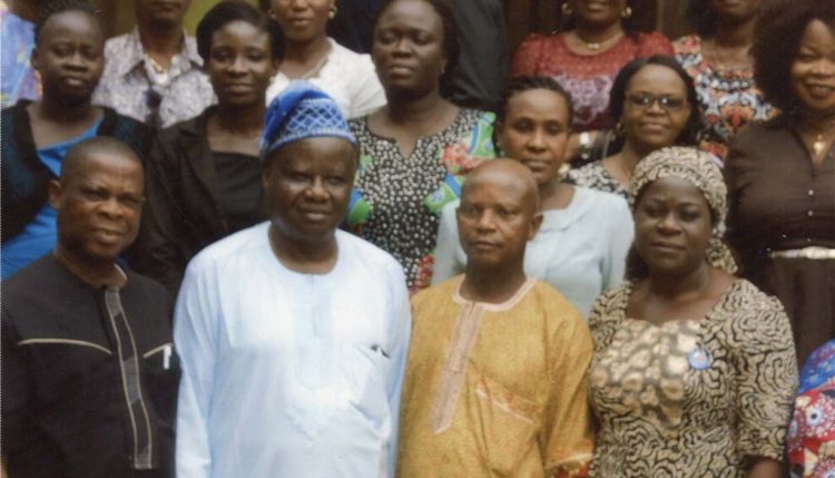 Picture of Librarian Louis Anajekwu with Prof Aina (wearing cap) and other delegates.