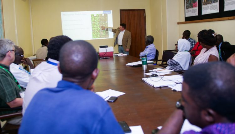 Picture of Dr Lee Simmons of Agbiome making a presentation.