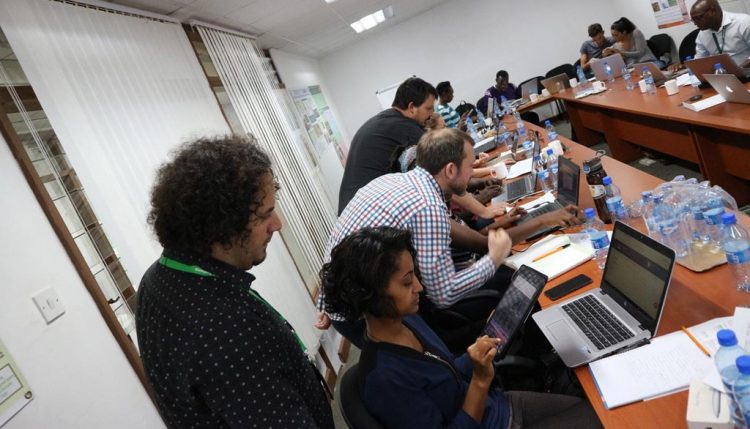 Picture of CIALCA staff share expertise on digital data collection, analysis and reporting. Photo by Marc Schut.