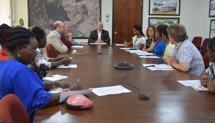 Picture of The Dutch Ambassador and his team in a discussion with some key IITA staff