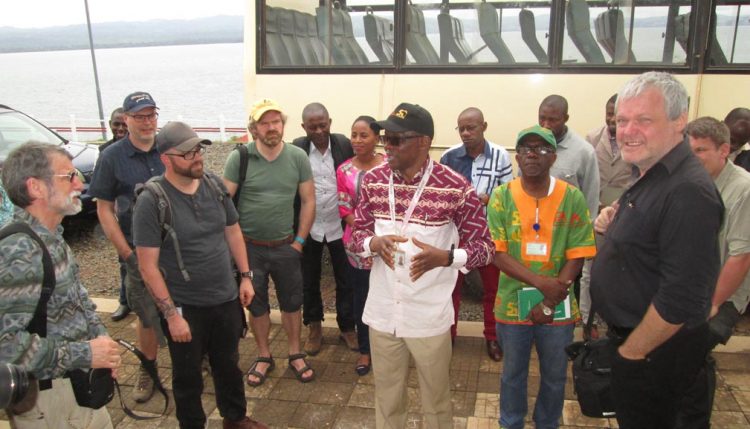 Picture of Dr Chris Okafor, OIC of IITA Bukavu Station, talks about IITA to the TropSoc delegation