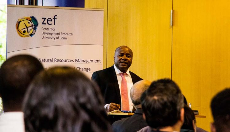 Picture of IITA Director General Nteranya Sanginga addressing Board members, German science and technology stakeholders, and other participants at a special session.