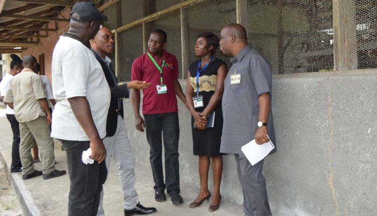 Picture of the IITA-Onne Youth Agripreneur explaining the youth program to the NDDC officials