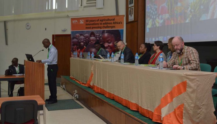 Picture of Tope Adegboyega, IARSAF President, addressing the participants at the annual symposium in IITA