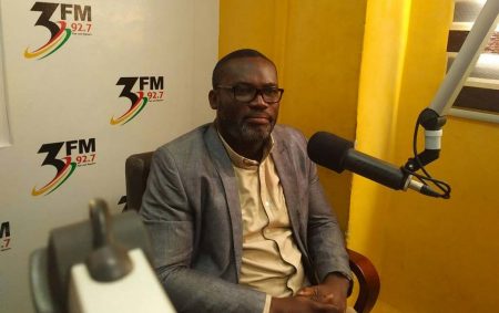 Picture of Richard Asare being interviewed at the 3FM studio in Accra