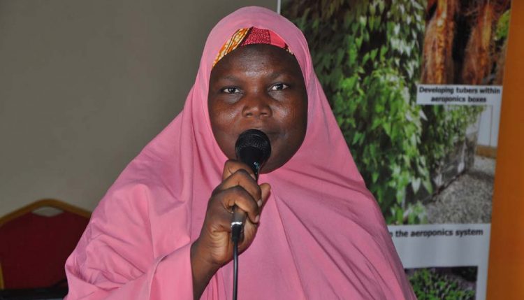 Picture of Aisha Abubakar, CAY-SEED beneficiary, sharing her experience and its impact on her life.