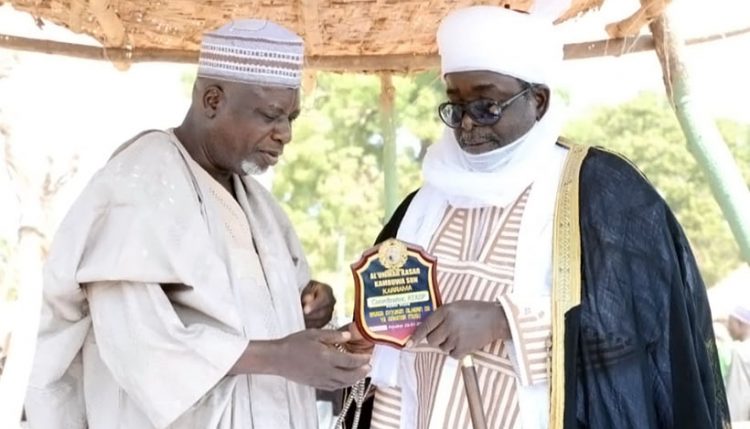 ATASP-1 Kebbi Sokoto zonal program coordinator receiving his award from Alhaji Haruna Jada.