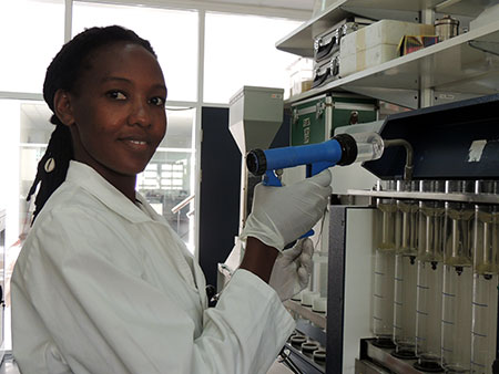 Judith Peter, IITA Food Analyst, carrying out some laboratory analysis.