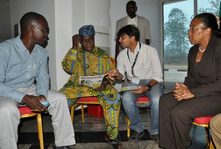 Picture of President Olasegun Obasanjo (left) talking to Lava Kumar (right) about efforts to contain banana bunchy top.
