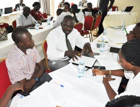 Picture of Participants deliberating during the workshop