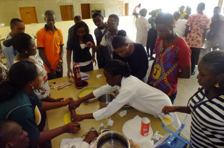 Picture of Youth Agripreneurs preparing food products during the training