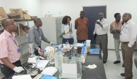 Picture of participants receive training on testing for aflatoxins
