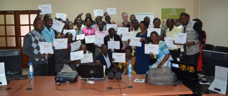 Picture of Youth Agripreneurs display their certificates of participation after the training.