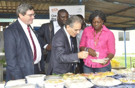 Picture of The IRD delegation tasting cassava food products at the cassava processing center in Ibadan.