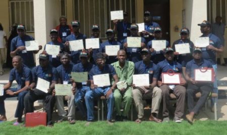 Picture of Northern Nigerian youths proudly display their certificates of completion