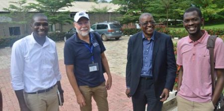 Picture of representative of IYA-Abuja, Per Hillbur, Gbassey Tarawali (Head of station), and Sadiq Gulma at the IITA-Abuja Station.