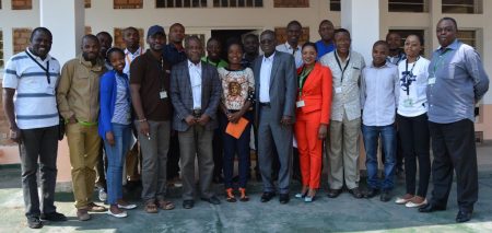 Picture of Prof Kadiata (5th from left) in a group picture with IITA scientists and IKYA members.