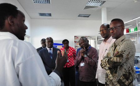 Picture of the team from Foreign Affairs Officials accompanied by staff at the hub on a tour of the laboratories.